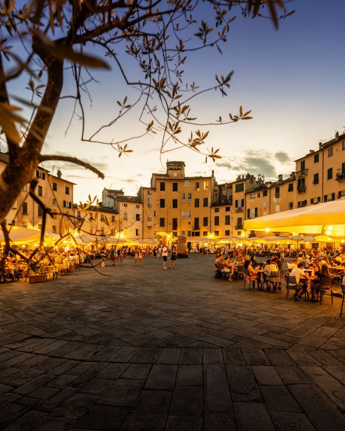 Vacation rental apartment in Lucca with historic walls in the background.